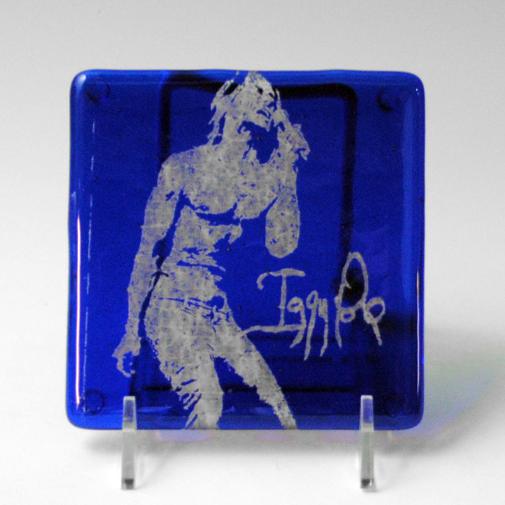 a blue plate with a drawing of a baseball player