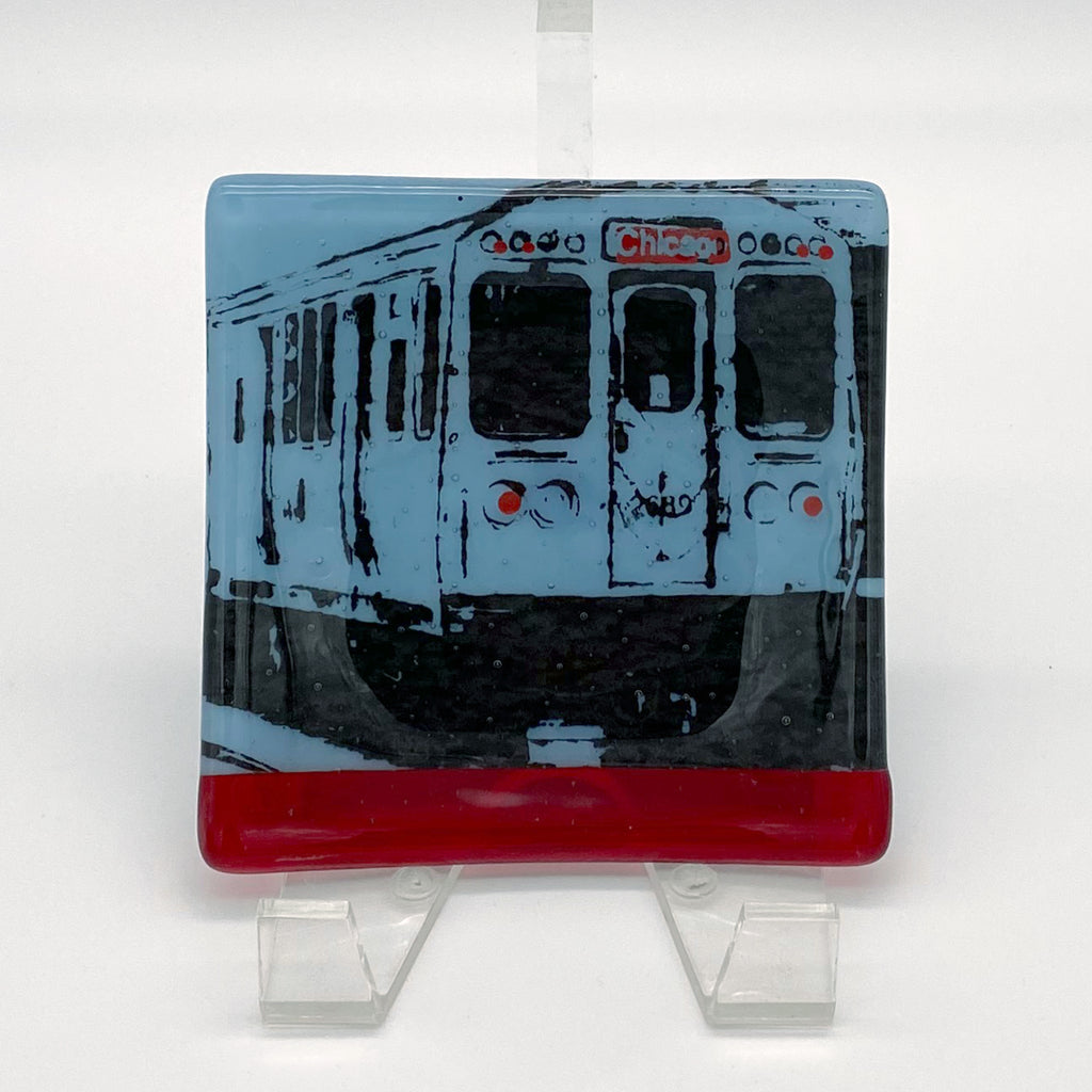 a glass picture of a train on a white background