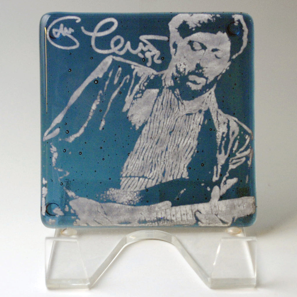 a glass block with a picture of a man holding a baseball bat