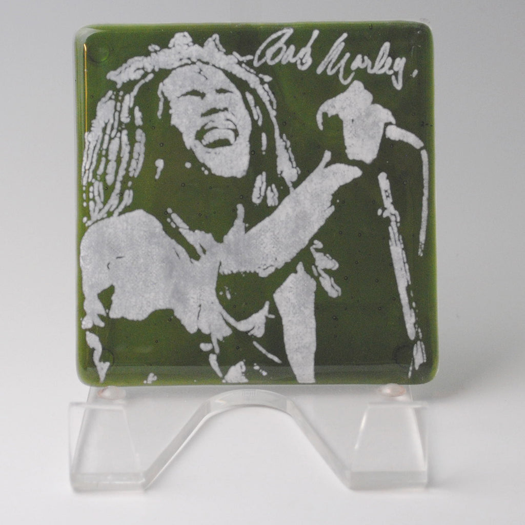 a glass block with a picture of bob marley on it