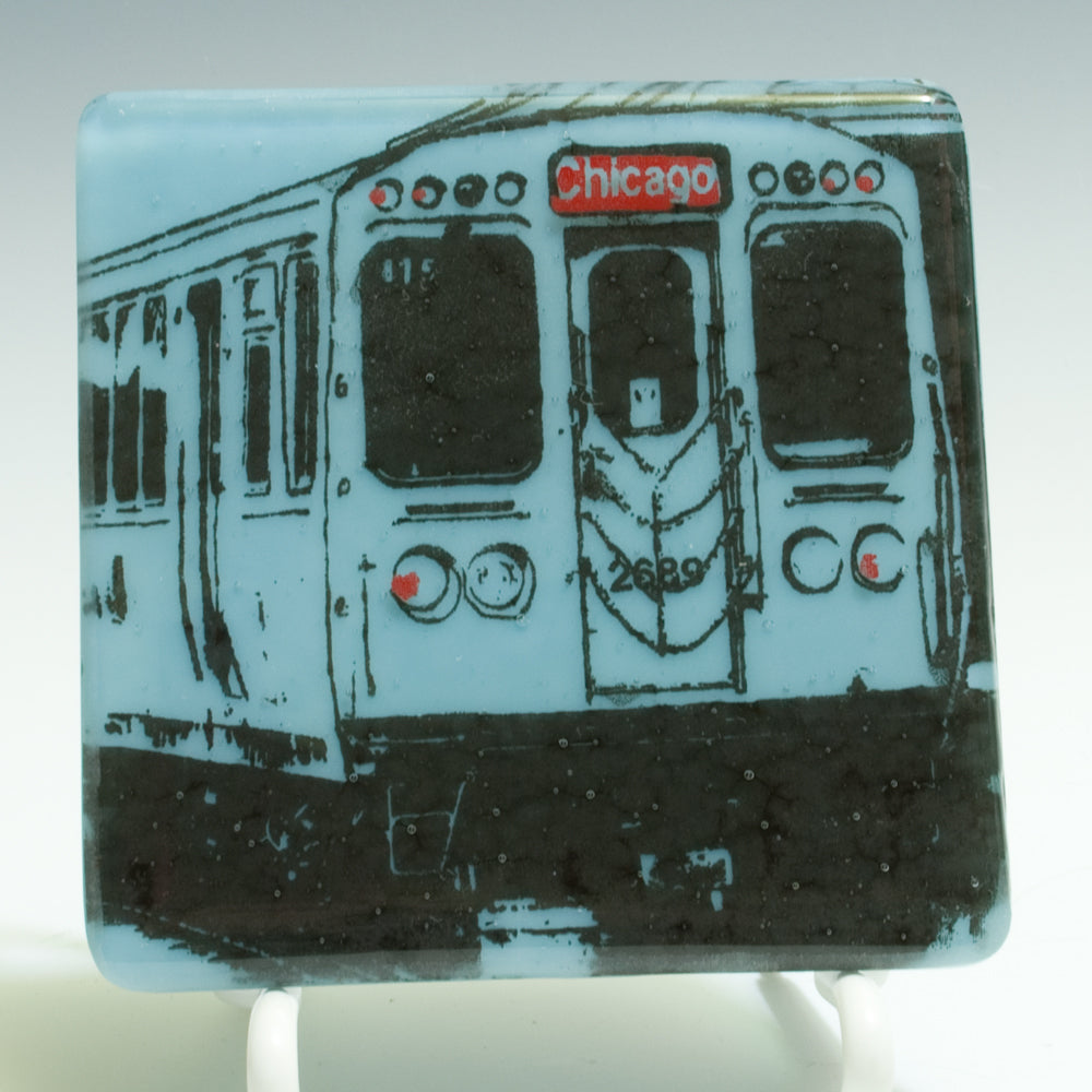 a glass block with a picture of a train on it