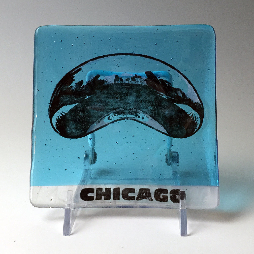 a glass plate with a picture of a chicago skyline